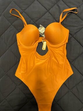 SKIMS deep plunge back bodysuit in bronze